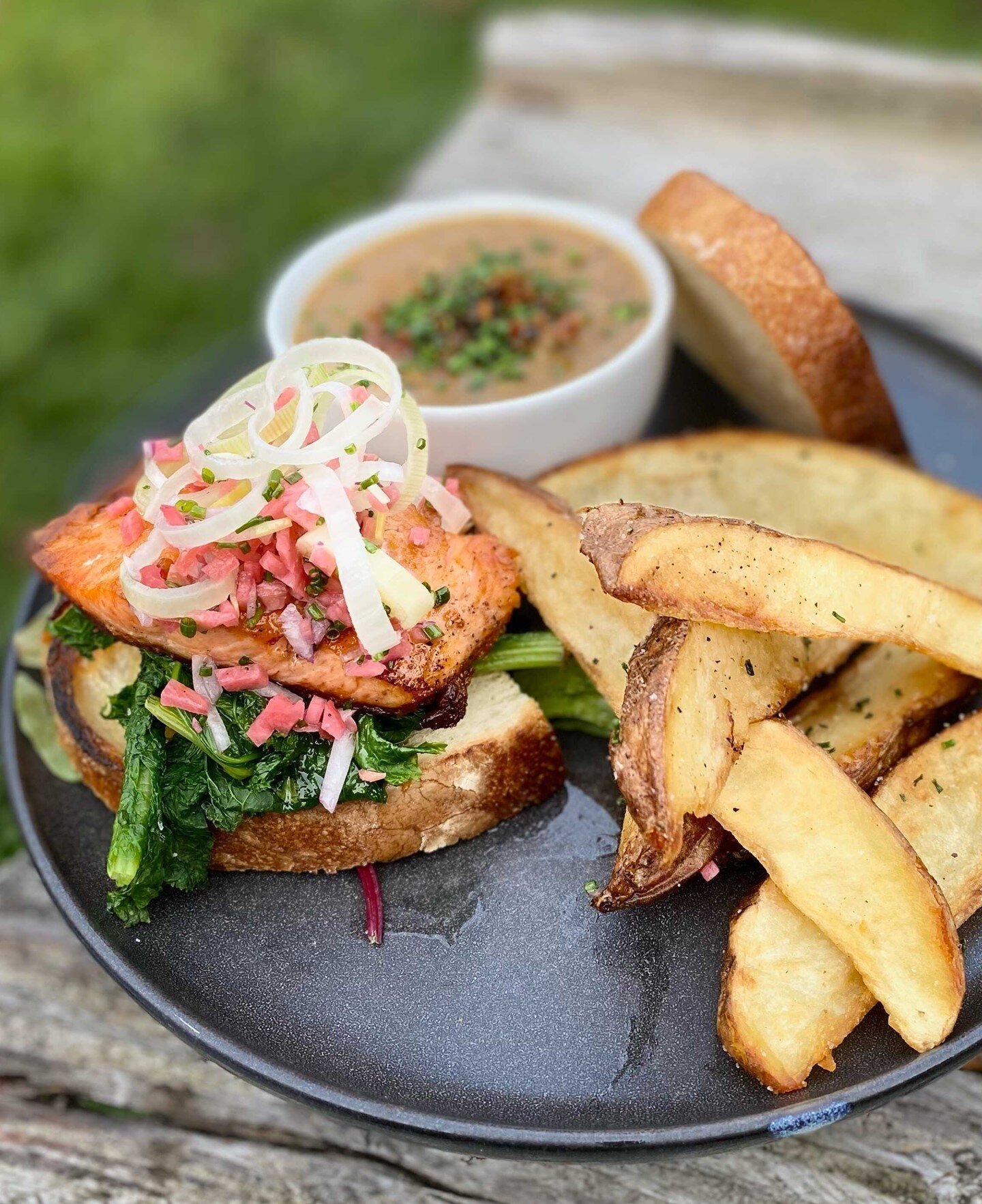 Hungry? Come by from 3-8pm to try our open faced baked salmon sandwich. Topped with pickled radish, marinated leeks, wilted winter greens, red onions, smoked roe, roasted winter blue corn meal chowder, and topped with ground herb-onion fried salmon skin.⁠
⁠
🎸 We've got some amazing acts playing in our venue tonight and tomorrow as well. Whether you're into New Orleans' The Rebirth Brass Band (@rebirthbrassband) or Blistered Earth's (@blisteredearthtribute) sweet Metallica melodies, we've got your covered! ⁠
⁠
🎟️Tickets available on our website.⁠
🍽️ The Patio is open Wed-Sun, 9am-8pm. Happy hour 2-5pm, 2-3pm serving happy hour only.⁠